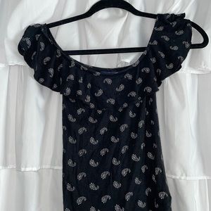 Off the shoulder shirt size small black with fun white pattern